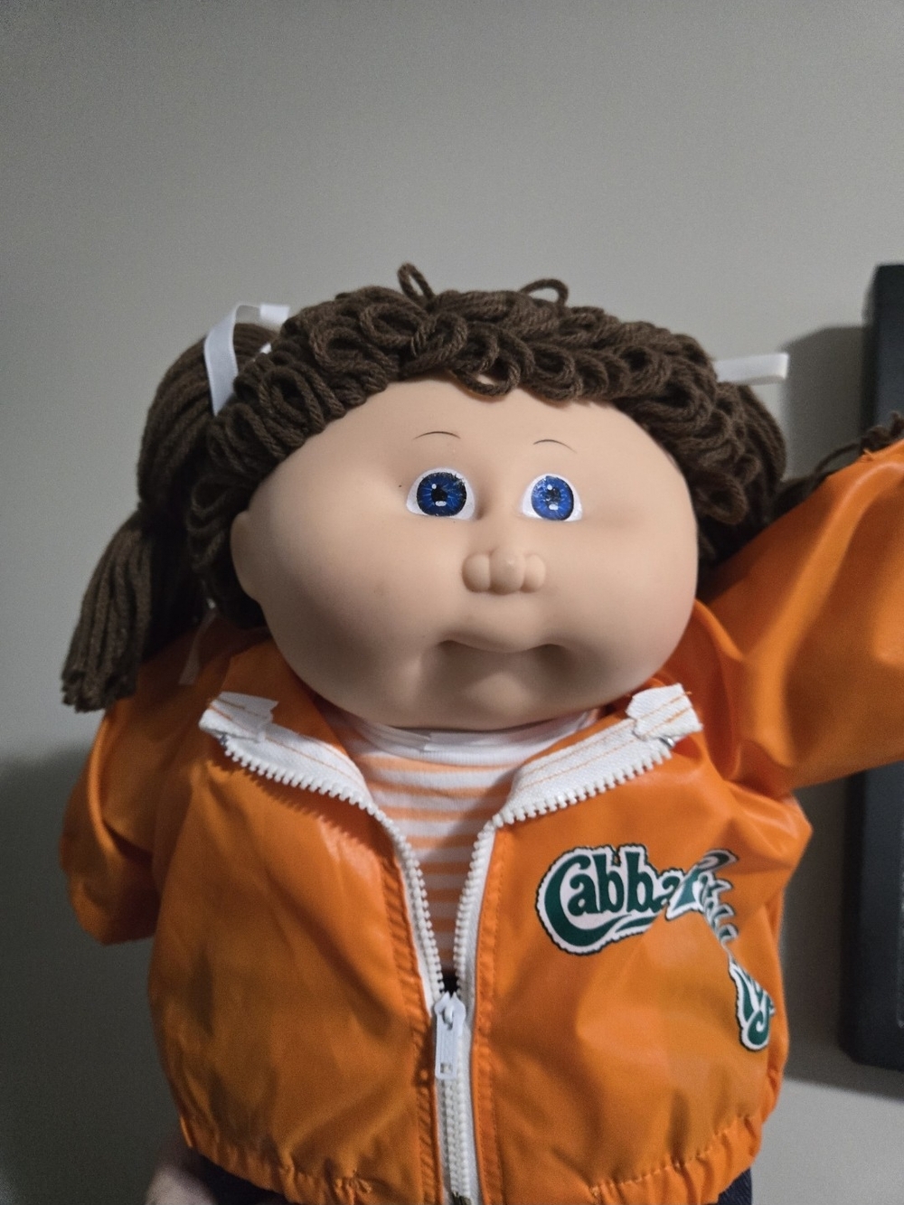 Cabbage Patch Brown-Haired Doll in Orange Jacket